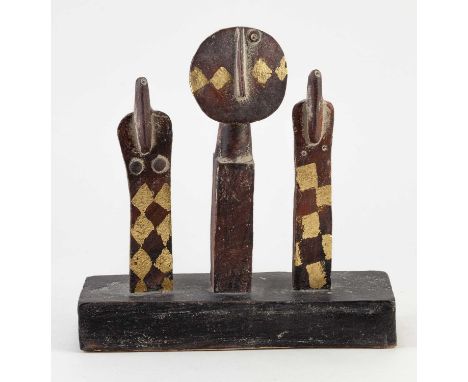 † JOHN MALTBY (1936-2020); a stoneware sculpture of two figures flanking a sculpture on a plinth, impressed M mark and inscri