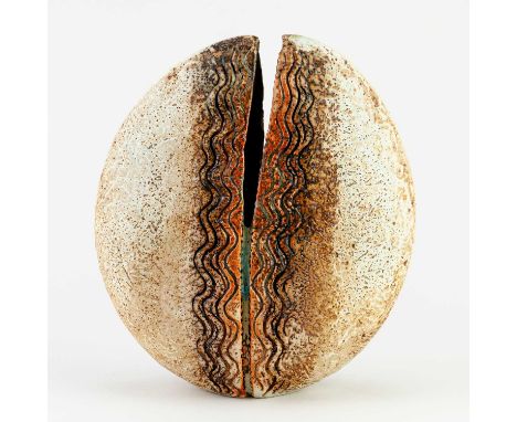 † ALAN WALLWORK (1931-2019); a stoneware split pebble with incised decoration around the parting picked out in turquoise glaz