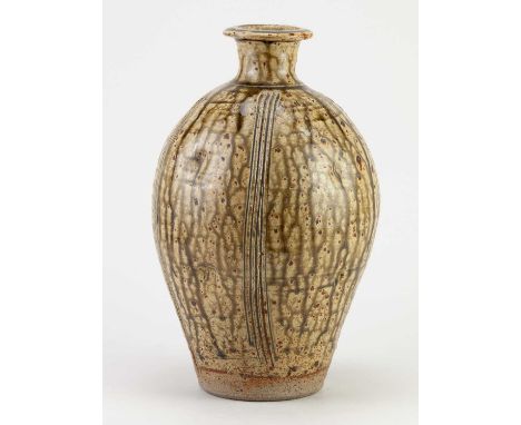 † JIM MALONE (born 1946); a stoneware bottle covered in running green ash glaze with incised decoration, impressed JM mark, h