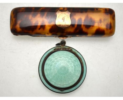 A late Victorian tortoiseshell needle-case with 15ct gold hinge and catch, the ivory insert fitted with an unmarked yellow me