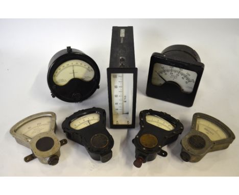 Seven various vintage industrial moving coil meters, to/w a Vignoles & Evershed manual (box)