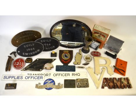 A quantity of railway artefacts, including Swiss-French lavatory roll holder, engine plates, lettering, pointing hand, spikes