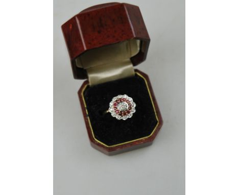 A ruby and diamond three-row cluster ring, 9ct white and yellow gold claw and pave setting