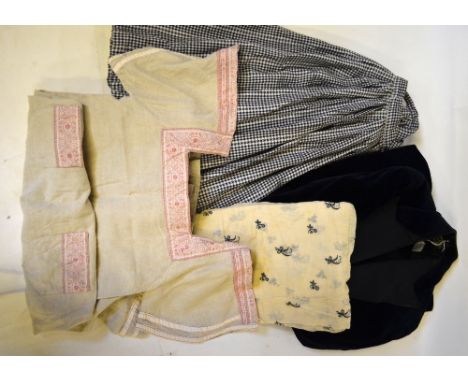 A box of mixed vintage clothing to include a black crepe skirt, embroidered lawn shawl, cami-knickers, Harrods checked skirt,