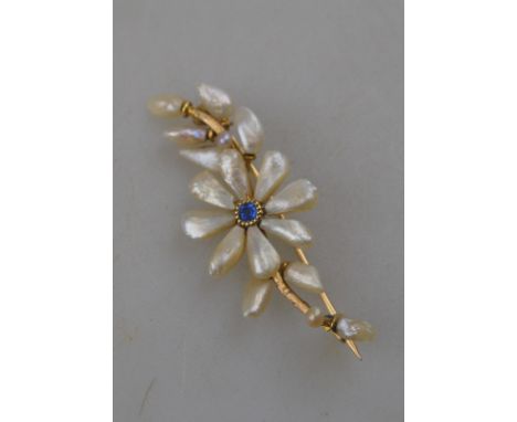 A freshwater pearl and sapphire spray brooch, stamped 14k