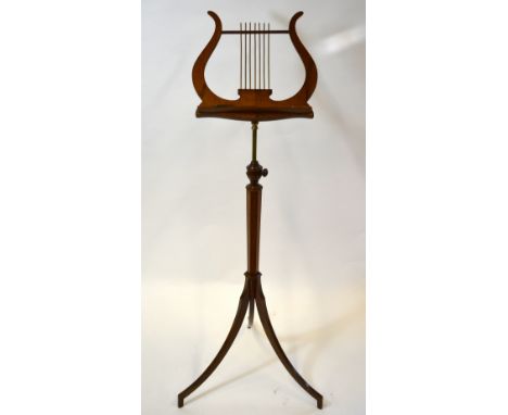 A walnut lyre-form rise and fall tripod music stand, circa 1900