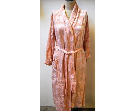 A box of vintage clothing to include cream striped silk blouse, floral dress, padded bed jacket, a black satin evening skirt,