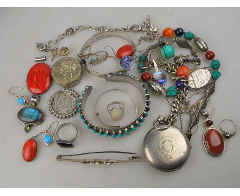 A collection of mostly modern costume jewellery including turquoise set bangle, multi-stone bead necklace, silver bangles, ri