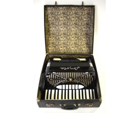 A black-cased Sonola piano accordion with 34 keys and 72 buttons, in carrying-case Condition Report Appears to be in good use