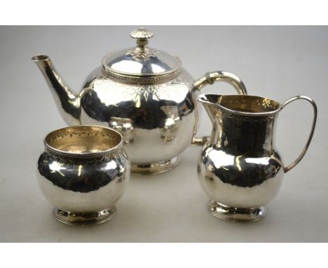 A silver bullet-shape three-piece tea service in the William & Mary manner, John Paul Cooper, London 1920, 24.4 oz gross