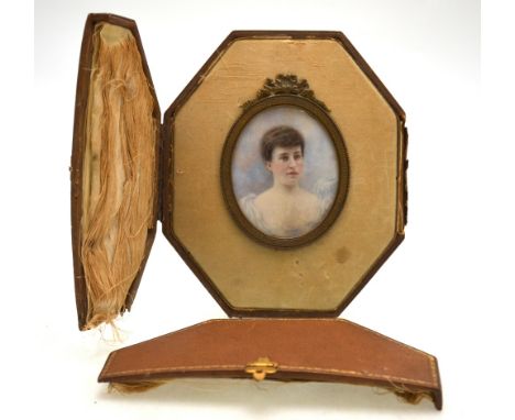 Arthur Albert 'Esme' Collings, an oval portrait miniature on ivory of a young lady, signed, 7 x 5.5 cm, in gilt metal frame a