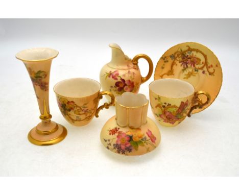 Royal Worcester blush ground floral decorated wares comprising a squat vase with fluted neck, shape 991, dated 1901, 8 cm, a 