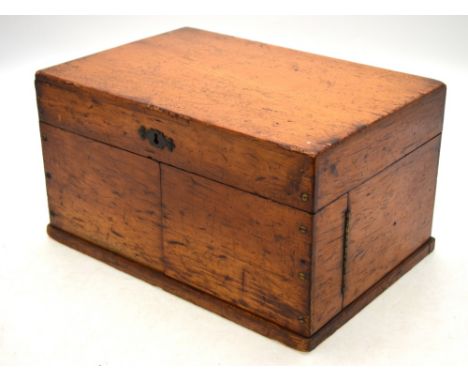 A Victorian games compendium, the case stamped Baker & Co containing Staunton pattern chess men, draughts, bone domino, dice,