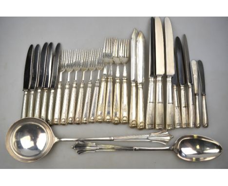 A set of six dessert forks with silver tines and loaded thread and shell handles, to/w five matching knives with steel blades