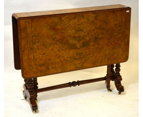 A Victorian burr walnut Sutherland table, the turned frame with gateleg on white ceramic castors, 89 x 17.5 cm (min) x 70 cm 