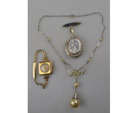 A lady's 9ct square cased wristwatch having circular dial on gilt metal strap to/w a silver locket having soldered fob brooch