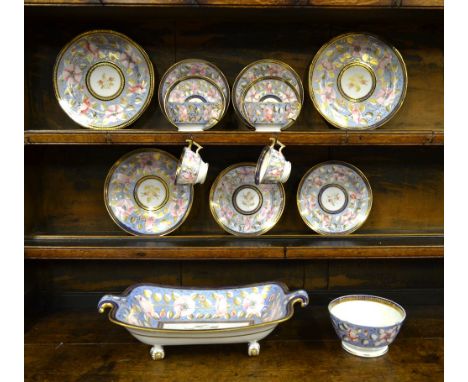 An early 19th century breakfast/tea service decorated with pink dog roses on a powder blue ground, possibly Minton, comprisin