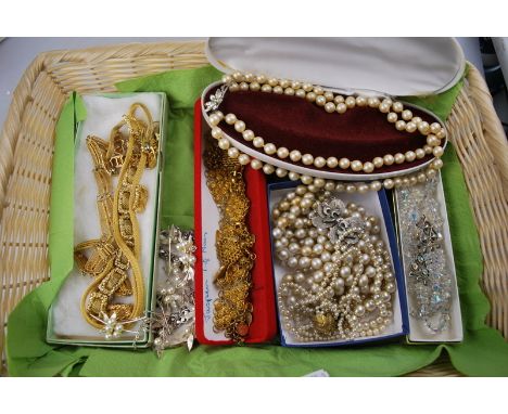 A collection of vintage jewellery - mostly necklaces - including simulated pearls, glass beads, gilt metal, etc