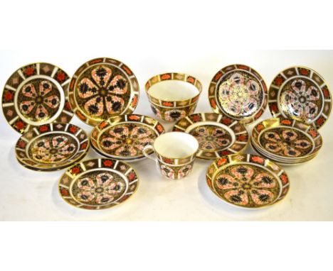 Royal Crown Derby tea wares, pattern 1128, comprising three x 16 cm plates, thirteen assorted saucers, one teacup and a sugar