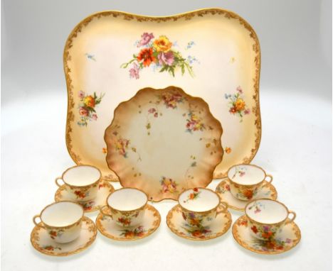 A Royal Doulton Burslem cabaret set, blush ground decorated with floral sprays and gilded borders, comprising a rectangular t