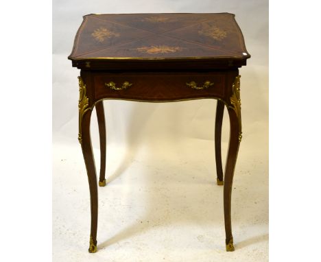 An early 20th century gilt metal mounted inlaid kingwood and satinwood envelope card table with baize lined interior over a f