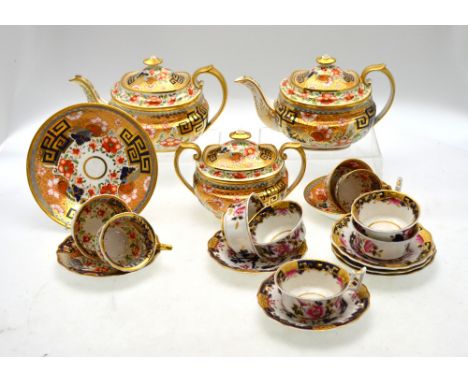 Ridgway tea wares depicting variations of the '841' pattern and comprising two late London shape teapots and covers, sucrier 