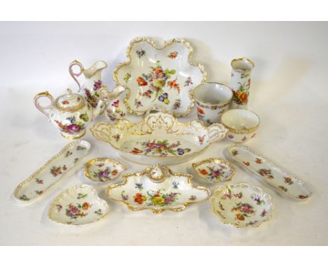 A collection of traditionally decorated Dresden porcelain including a leaf shaped dish, 24.5 cm diam, elliptical dish, small 