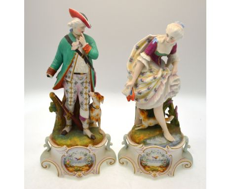 A pair of continental bisque figures, the lady modelled paddling with a dog, the gentleman with hunting hound and gun, both r
