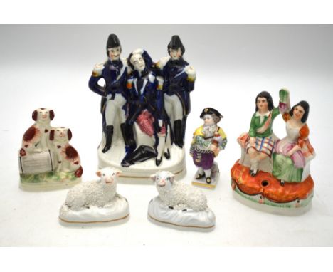 A Staffordshire flatback depicting the death of Nelson 18.5 cm high to/w flatback of two seated Scottish children with arms h