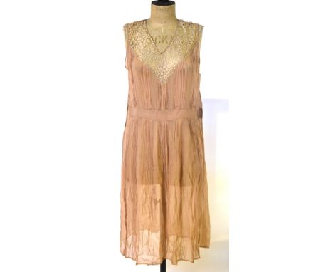 A dusky pink silk and mocha lace 1920s slip dress, a dusky pink silk georgette dress with tiered pleated skirt and bow detail