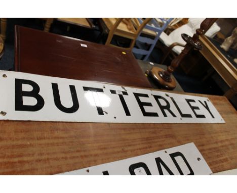 A LARGE ENAMEL BUTTERFLY SIGN