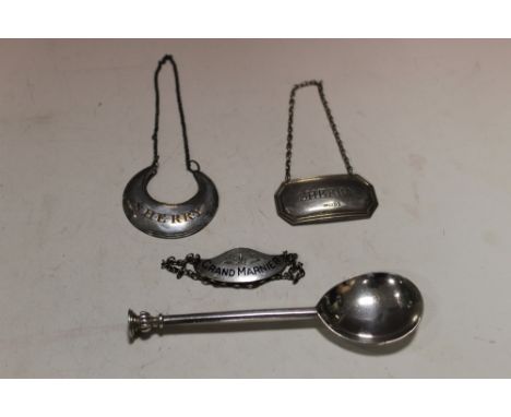 A HALLMARKED SILVER SEAL TOPPED SPOON TOGETHER WITH THREE SILVER DECANTER LABELS