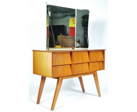 Beautility - An original 1960's retro vintage teak and walnut wood dressing table having a triple mirror top with a bank of 3