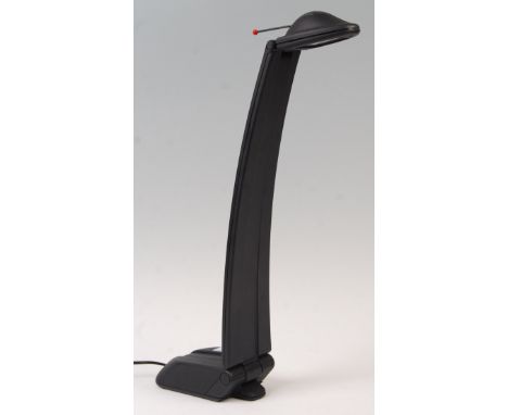 Neolt S.P.A. - Nessy - A 1980's retro vintage desk / table lamp having having a black plastic tapering form with a hinged bas