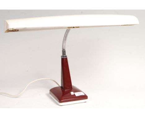 A mid 20th Century retro vintage bankers type desk / reading lamp having a wide white plastic shade on a goose neck arm raise