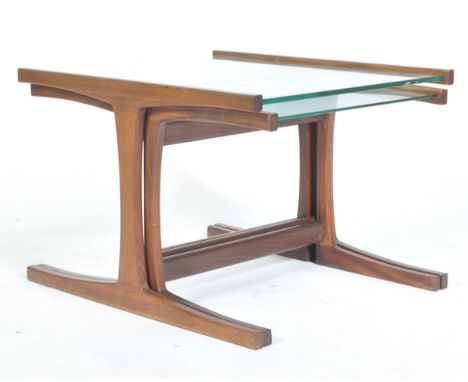 A stunning, rare and unusual 1960's retro vintage teak wood high end designer trinity nest of tables comprising of a larger g