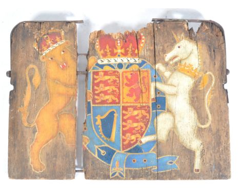 A rare and unusual mid 20th Century hand painted panel sign depicting The Royal Coat Of Arms Of The United Kingdom constructe