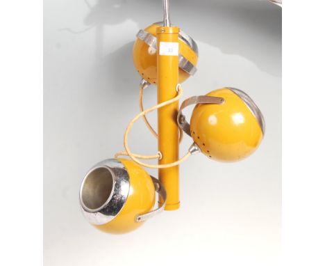 A 1960's retro vintage ' eyeball ' ceiling light fixture having a central column with three eyeball / sphere shades at differ