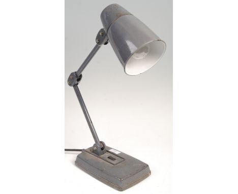 An original mid 20th Century retro vintage industrial factory work desk table lamp light. having a shaped wide conical shade 