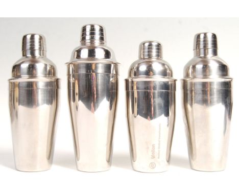 A collection of four original 20th Century Art Deco retro vintage bar cocktail shakers in chrome. Each of typical tapering cy