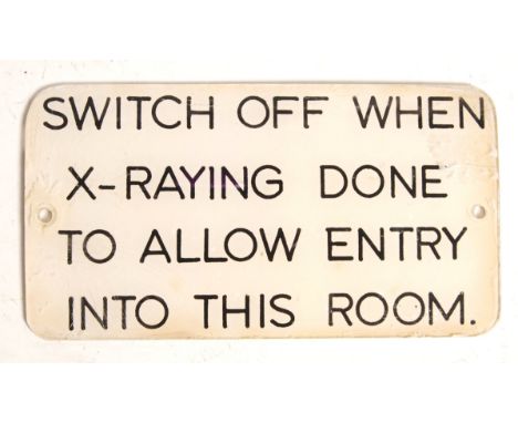 An original early 20th Century retro vintage Scientific Medical X-Ray room warning sign plaque of plastic construction. Round