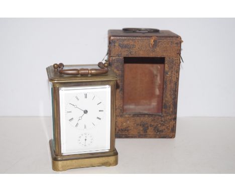 19th century French brass carriage clock Japy Freres Paris striking on a bell with original case. Measurements 13cm (H) x 10c