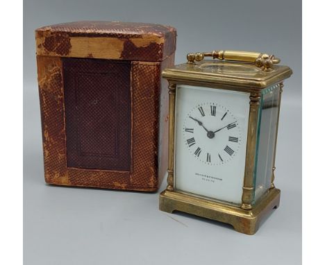 A brass cased Carriage clock with lever escapement, retailed by Bracher and Sydenham, complete with outer case 