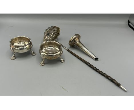 A pair of George III silver salts, London 1760, together with part of an Irish silver wine funnel and a horn handled Toddy la