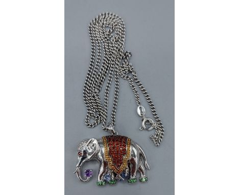A 925 silver pendent in the form of an elephant set with multi coloured stones together with a silver neck chain 