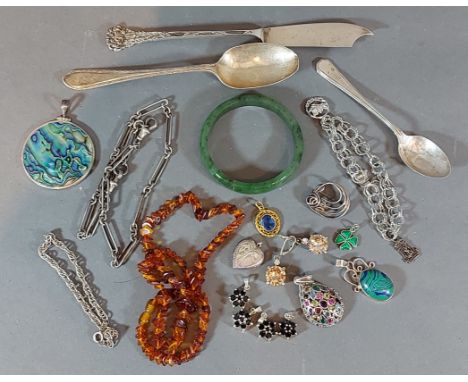 A silver watch chain together with other jewellery, a jade bangle and two silver spoons 