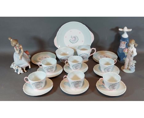 A Shelley Symphony pattern part tea service together with three Lladro figurines 