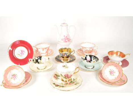 A collection of vintage 20th century porcelain china cups and saucers. Including Paragon, Aynsley, Royal Albert, Adderley, Ro
