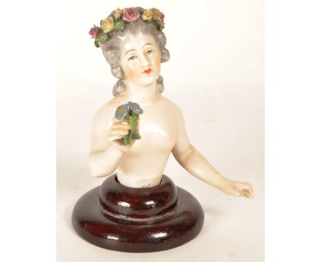 Ernst Wallis - An early 20th century circa 1900s Ernst Wallis German porcelain half doll pin cushion. Having porcelain roses 