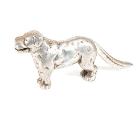 A vintage Victorian manner cast metal nutcracker. The nutcracker in the form of a dog with hinged tail nutcracker.